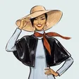 A woman holding a straw sun hat
